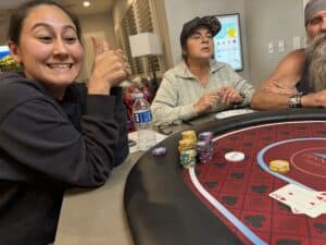 Kara hits a flush to pick up a big pot in Event 2